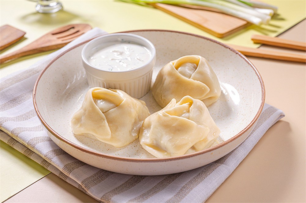 {{photo.Alt || photo.Description || 'Манты со свининой и говядиной'}}