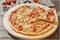 Пицца с копченой курицей 1000951